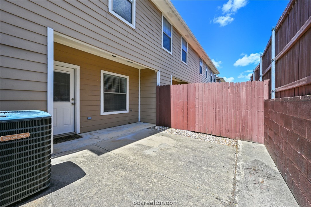 1000 Spring Loop, Unit 1904 College Station, TX 77840 - Photo 14 of 19 Fenced back yard