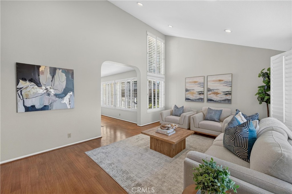 2935 Bluebell Avenue Brea, CA 92821 - Photo 5 of 38 Step inside to a spacious living room filled with natural light and highlighted by soaring ceilings