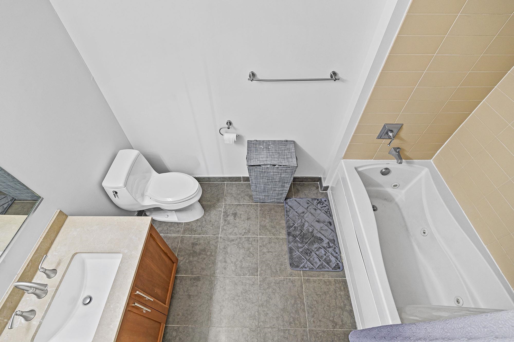 800 Jackson Street, Unit PH7 Hoboken, NJ 07030 - Photo 11 of 22 a bathroom with a sink and toilet