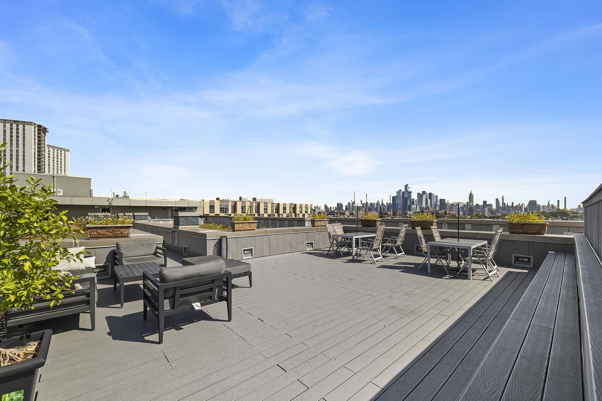 800 Jackson Street, Unit PH7 Hoboken, NJ 07030 - Photo 16 of 22 a terrace with outdoor seating and city view