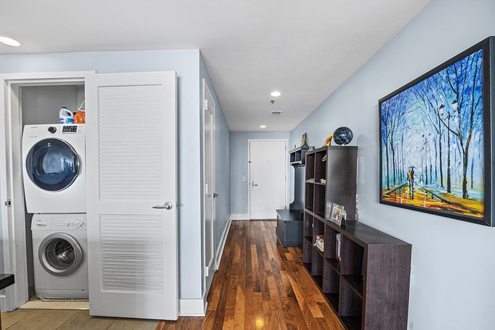 800 Jackson Street, Unit PH7 Hoboken, NJ 07030 - Photo 7 of 22 a view of a hallway with washer and dryer
