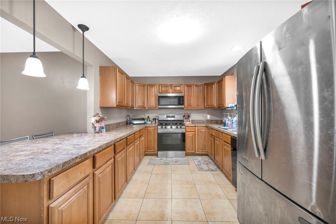 14333 Turney Road Maple Heights, OH 44137 - Photo 4 of 35 Kitchen with pendant lighting