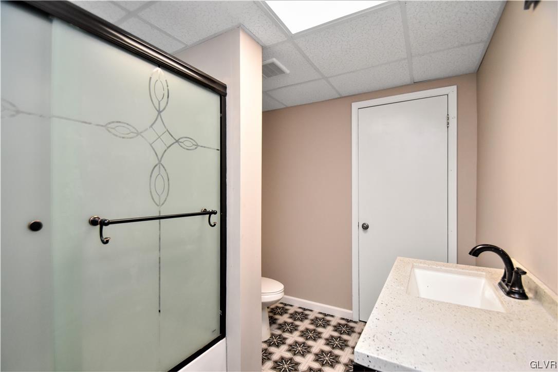 28 South 5th Street Emmaus, PA 18049 - Photo 14 of 23 a bathroom with a sink and a mirror