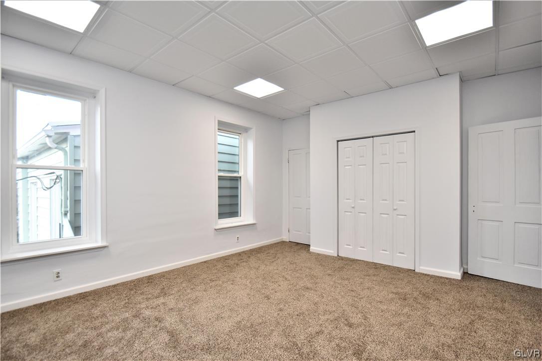 28 South 5th Street Emmaus, PA 18049 - Photo 17 of 23 an empty room with windows