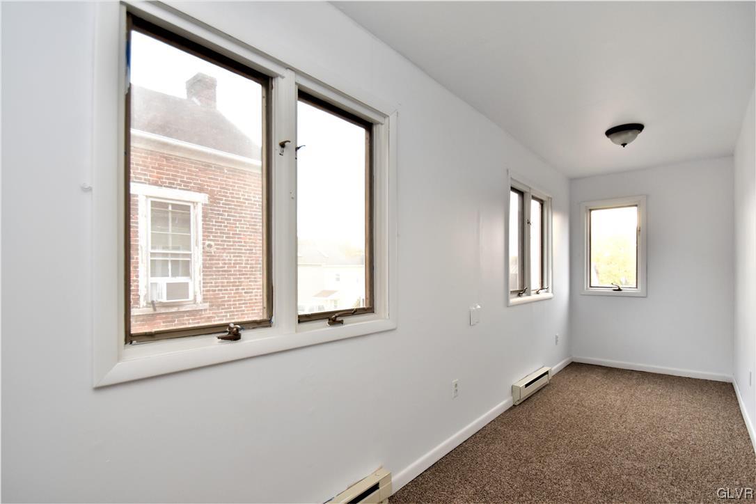 28 South 5th Street Emmaus, PA 18049 - Photo 18 of 23 a view of an empty room with a window