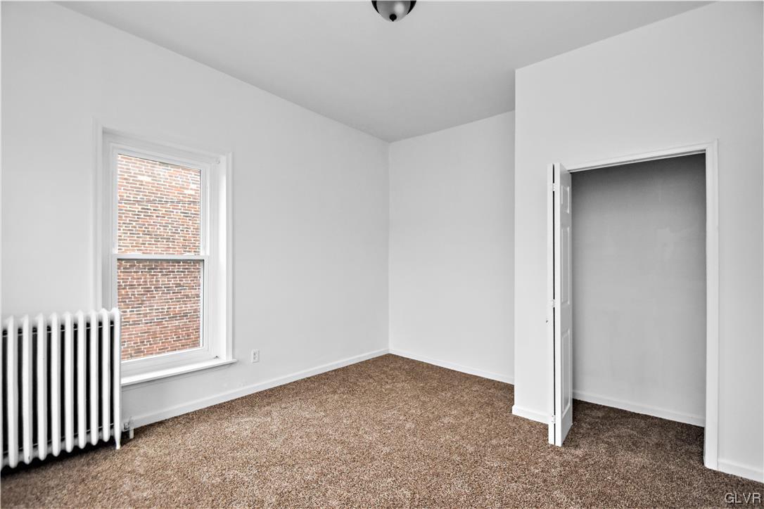 28 South 5th Street Emmaus, PA 18049 - Photo 20 of 23 an empty room with windows