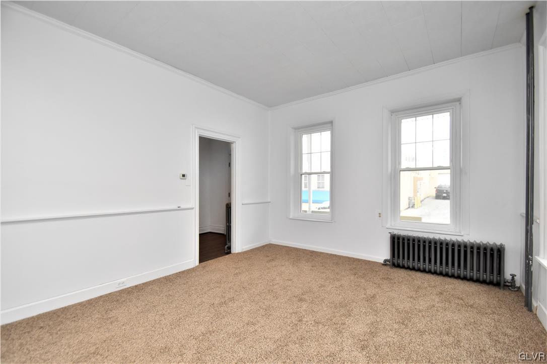 28 South 5th Street Emmaus, PA 18049 - Photo 6 of 23 an empty room with windows