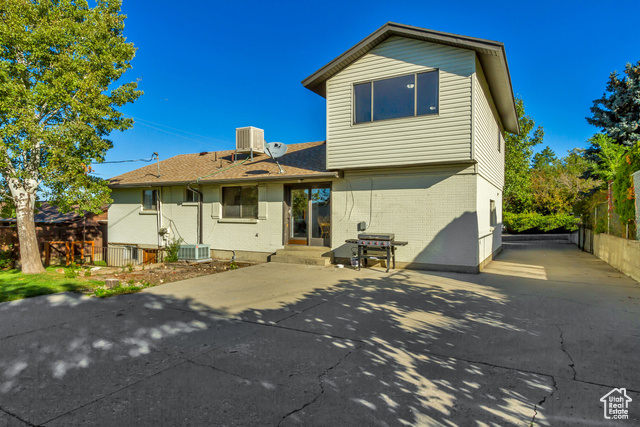 360 East Center Street Centerville, UT 84014 - Photo 8 of 41 Back of property with brick siding