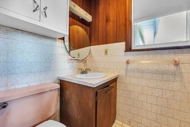 a fireplace with white walls