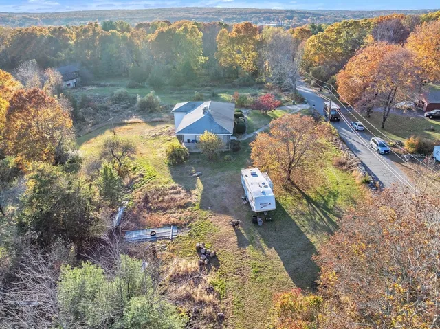 a white building with a white wall and a white refrigerator