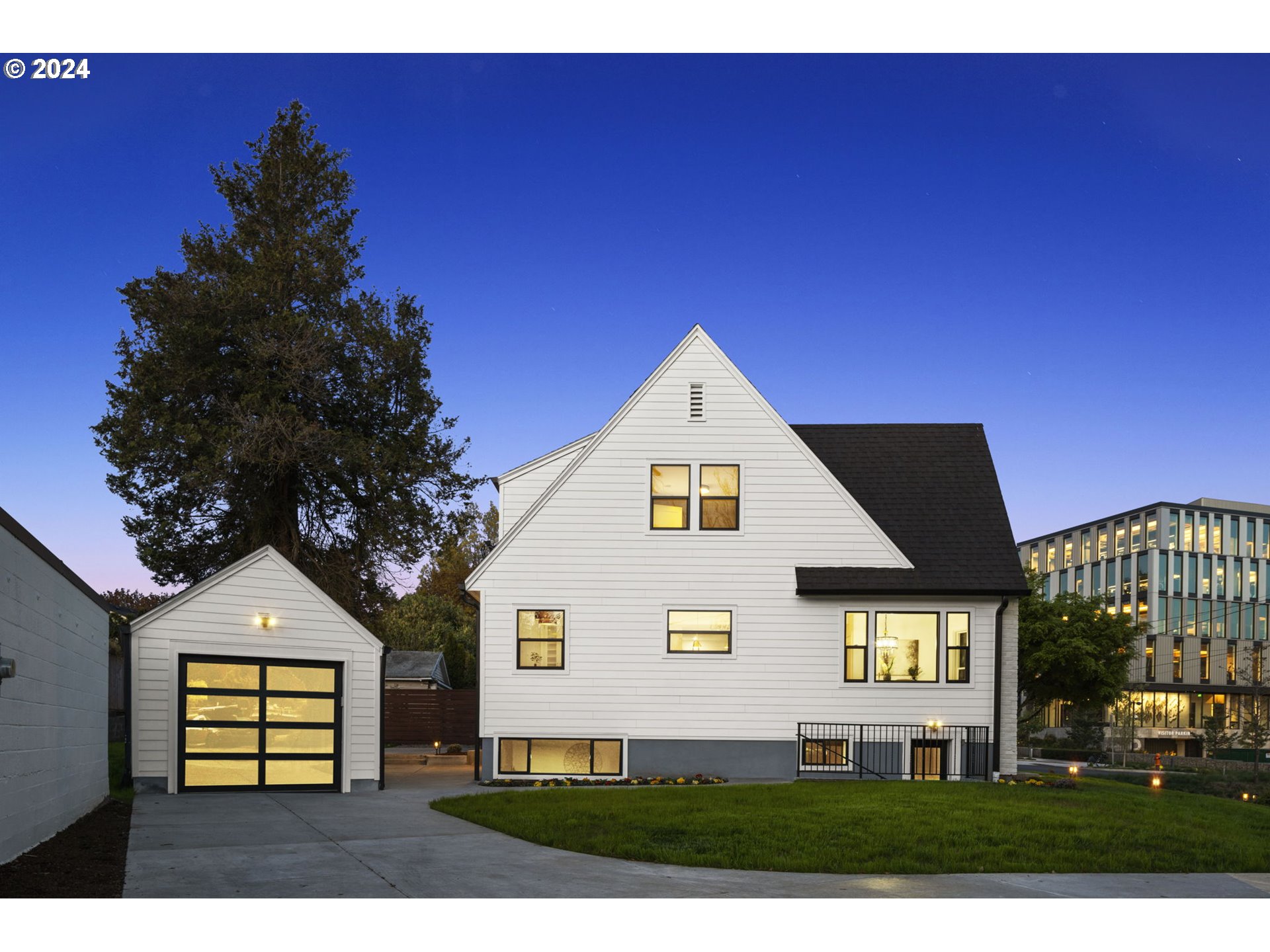 2639 North Sumner Street Portland, OR 97217 - Photo 3 of 46 a front view of a house with a yard