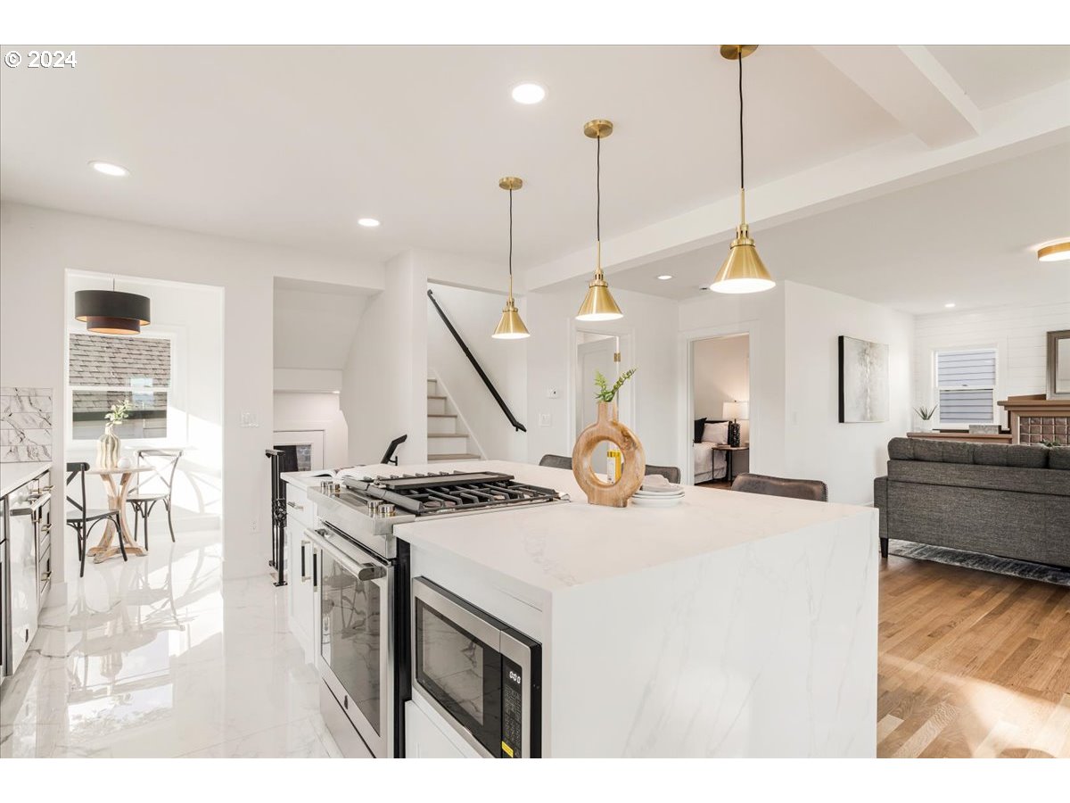 2639 North Sumner Street Portland, OR 97217 - Photo 8 of 46 a view of a kitchen and a stove