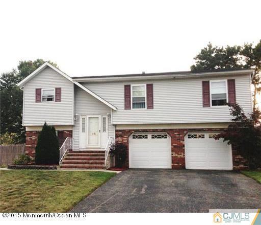45 Starlight Road Howell, NJ 07731 - Photo 1 of 14 a view of a house with a backyard