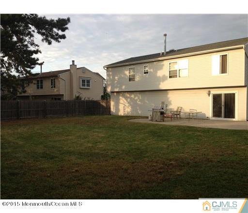 45 Starlight Road Howell, NJ 07731 - Photo 14 of 14 a front view of a house with a yard