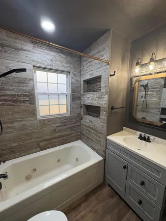 a backyard of a house with table and chairs