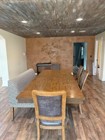 a view of a dining room with furniture