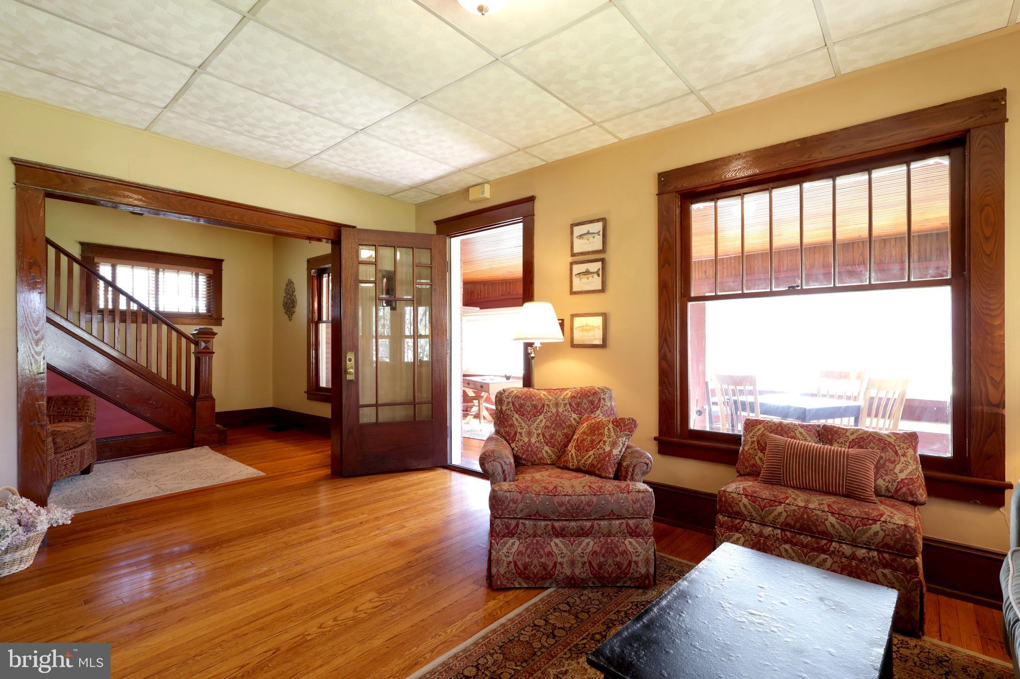 1343 Penns Creek Road Coburn, PA 16832 - Photo 13 of 92 a living room with furniture and a large window
