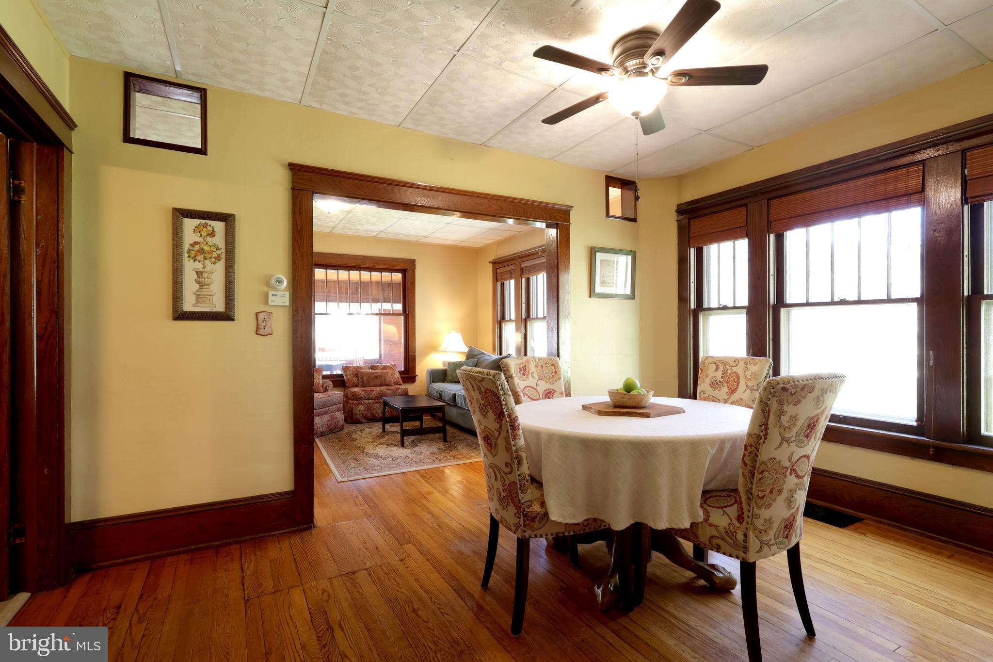 1343 Penns Creek Road Coburn, PA 16832 - Photo 15 of 92 a view of a dining room with furniture window and wooden floor