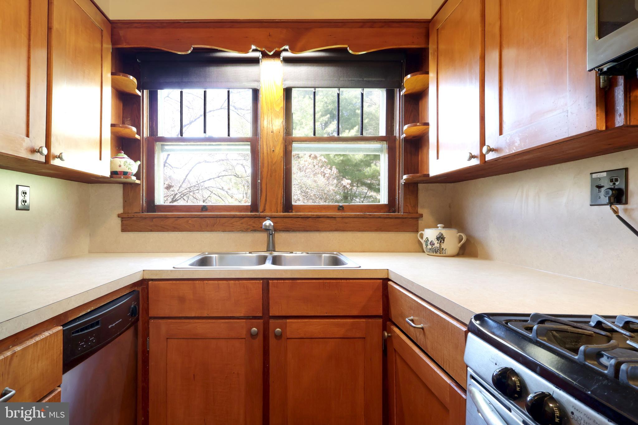 1343 Penns Creek Road Coburn, PA 16832 - Photo 20 of 92 a kitchen with a sink and a window
