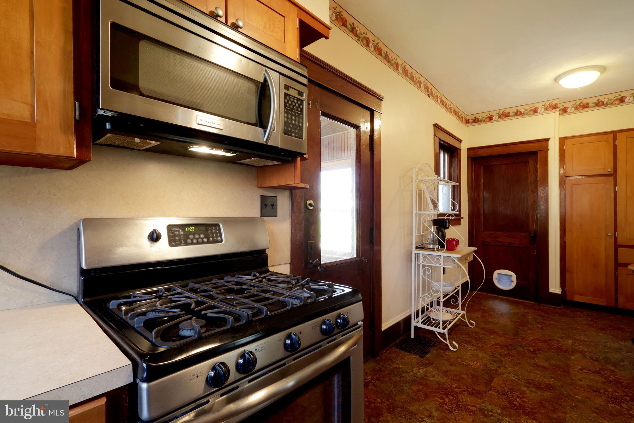 1343 Penns Creek Road Coburn, PA 16832 - Photo 22 of 92 a kitchen with a stove and a microwave