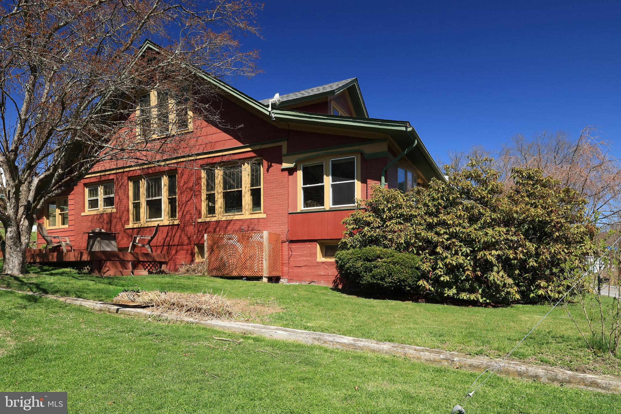 1343 Penns Creek Road Coburn, PA 16832 - Photo 37 of 92 front view of a house with a garden
