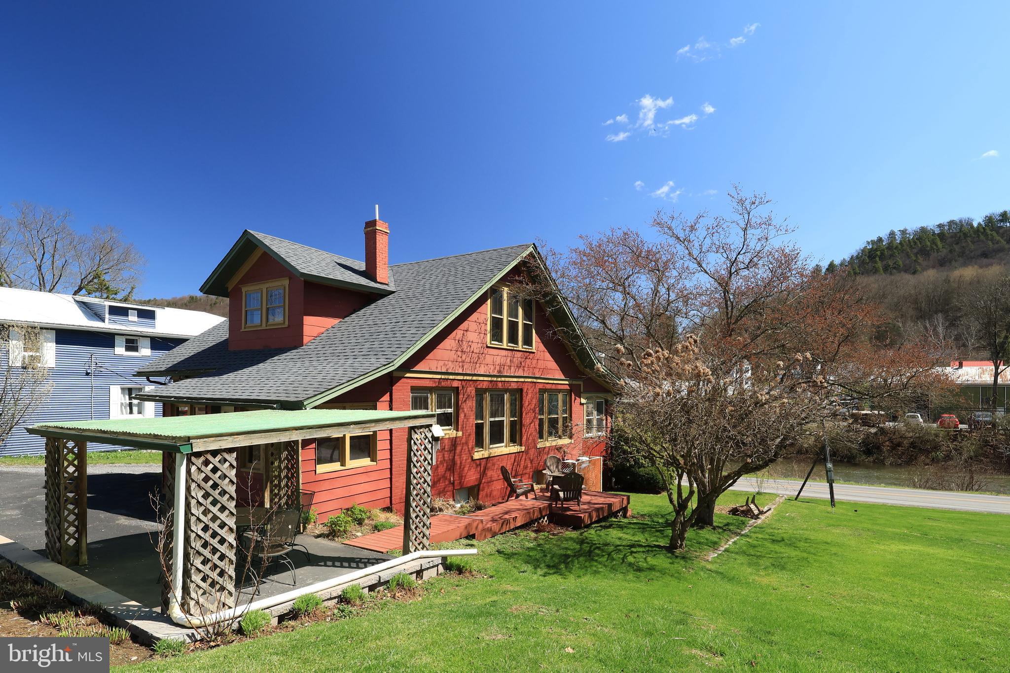 1343 Penns Creek Road Coburn, PA 16832 - Photo 40 of 92 a front view of house with yard and green space