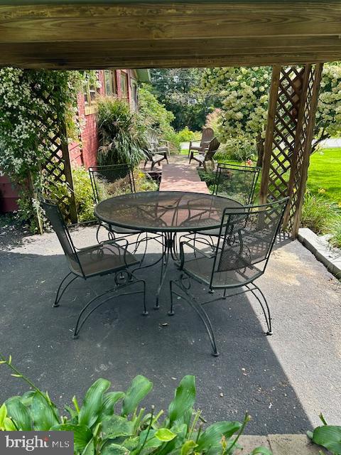 1343 Penns Creek Road Coburn, PA 16832 - Photo 42 of 92 a view of a patio with table and chairs and potted plants