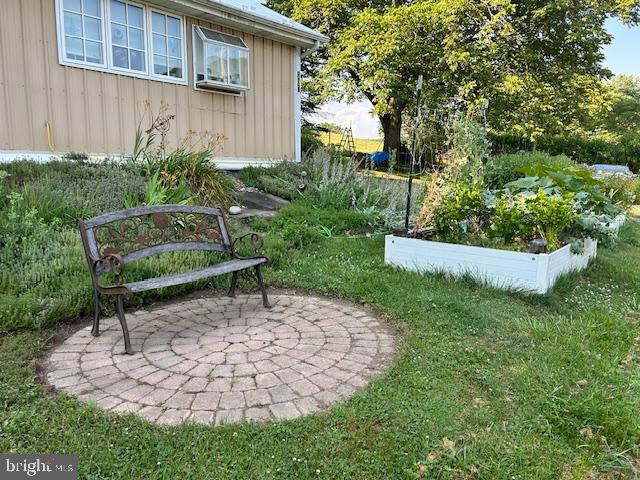 1343 Penns Creek Road Coburn, PA 16832 - Photo 63 of 92 a view of a chair and table in the garden