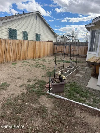 a view of a backyard with tv