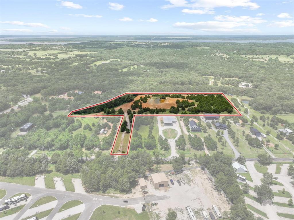 1445 Cedar Mills Road Gordonville, TX 76245 - Photo 4 of 28 Expansive parcel featuring a mix of cleared land and mature tree coverage