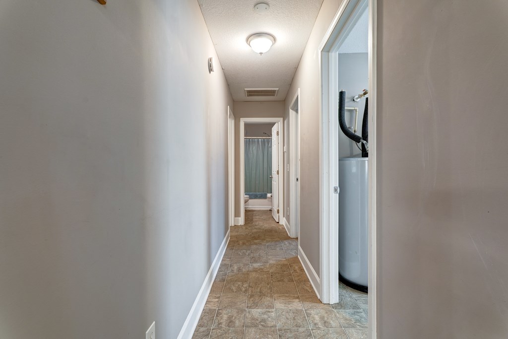 104 Nugget Lane Ellijay, GA 30540 - Photo 16 of 36 a view of a hallway with wooden floor