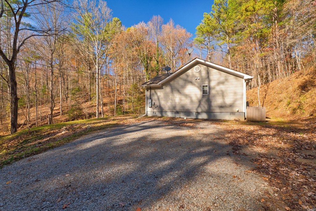 104 Nugget Lane Ellijay, GA 30540 - Photo 19 of 36 a view of a house with a yard