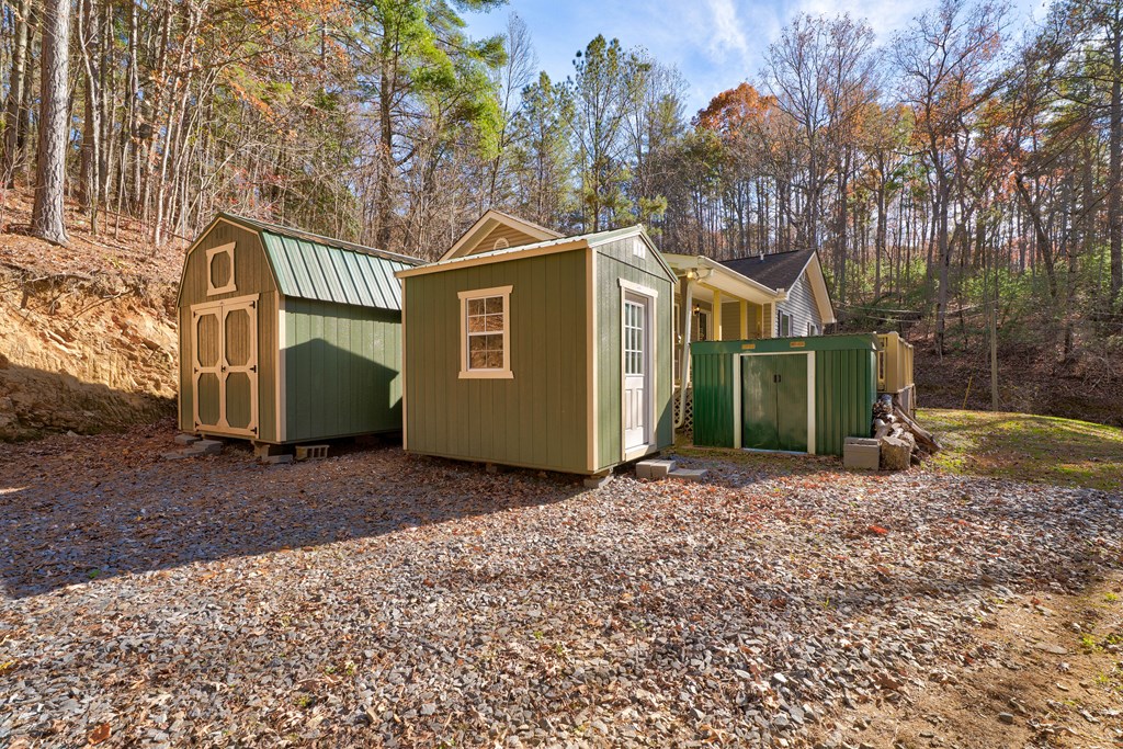 104 Nugget Lane Ellijay, GA 30540 - Photo 35 of 36 a view of a house with a yard and a tree