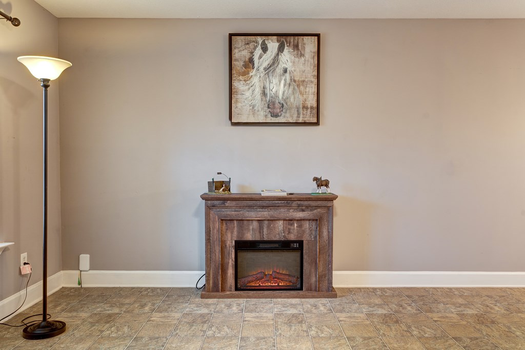 104 Nugget Lane Ellijay, GA 30540 - Photo 5 of 36 a view of an empty room with a fireplace