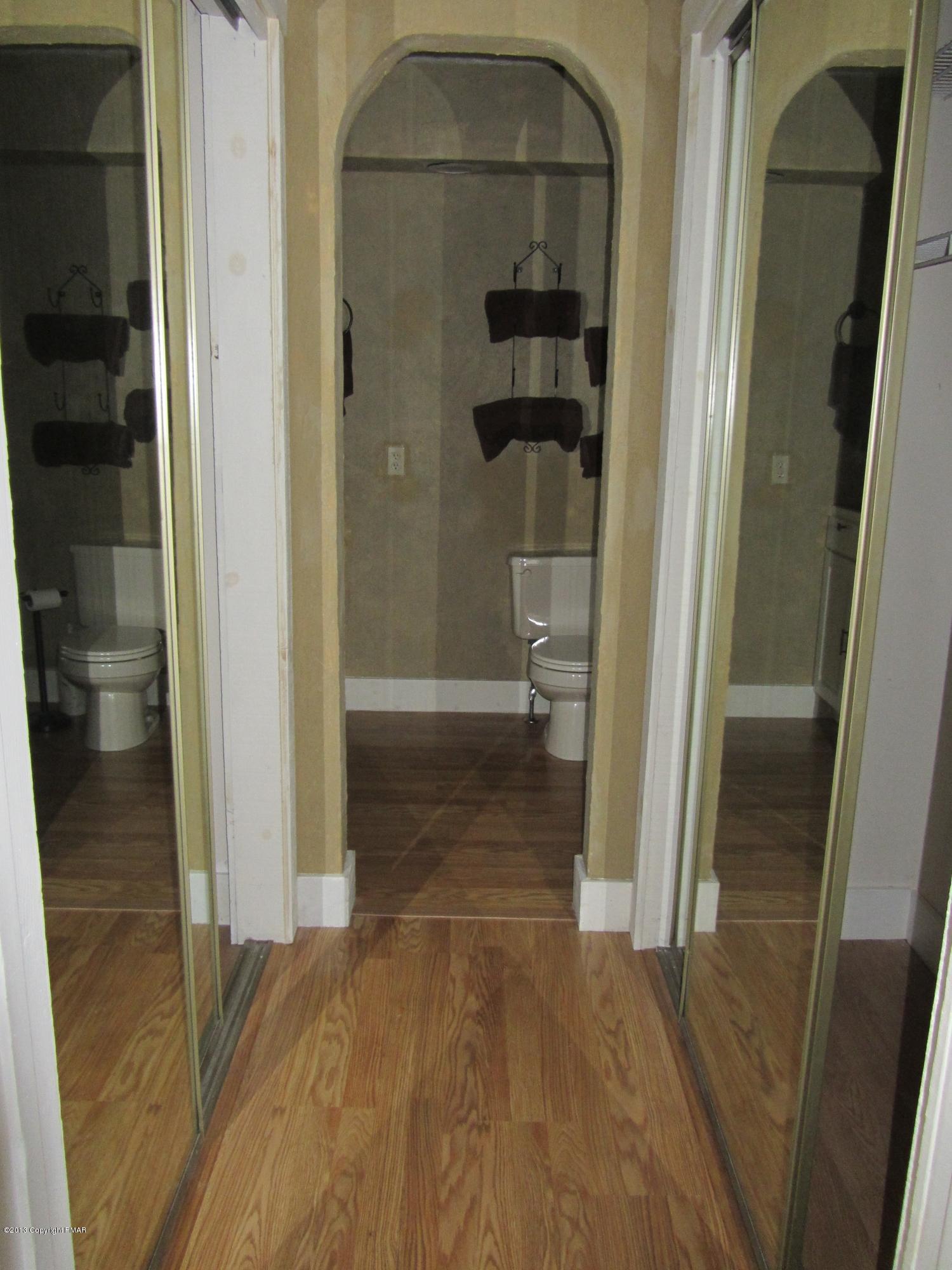156 Snow Ridge Village Rd Lake Albrightsville, PA 18210 - Photo 12 of 22 Hallway with Closets to Master bath