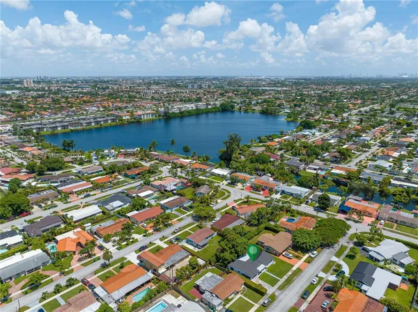 an aerial view of a city with lots of residential buildings