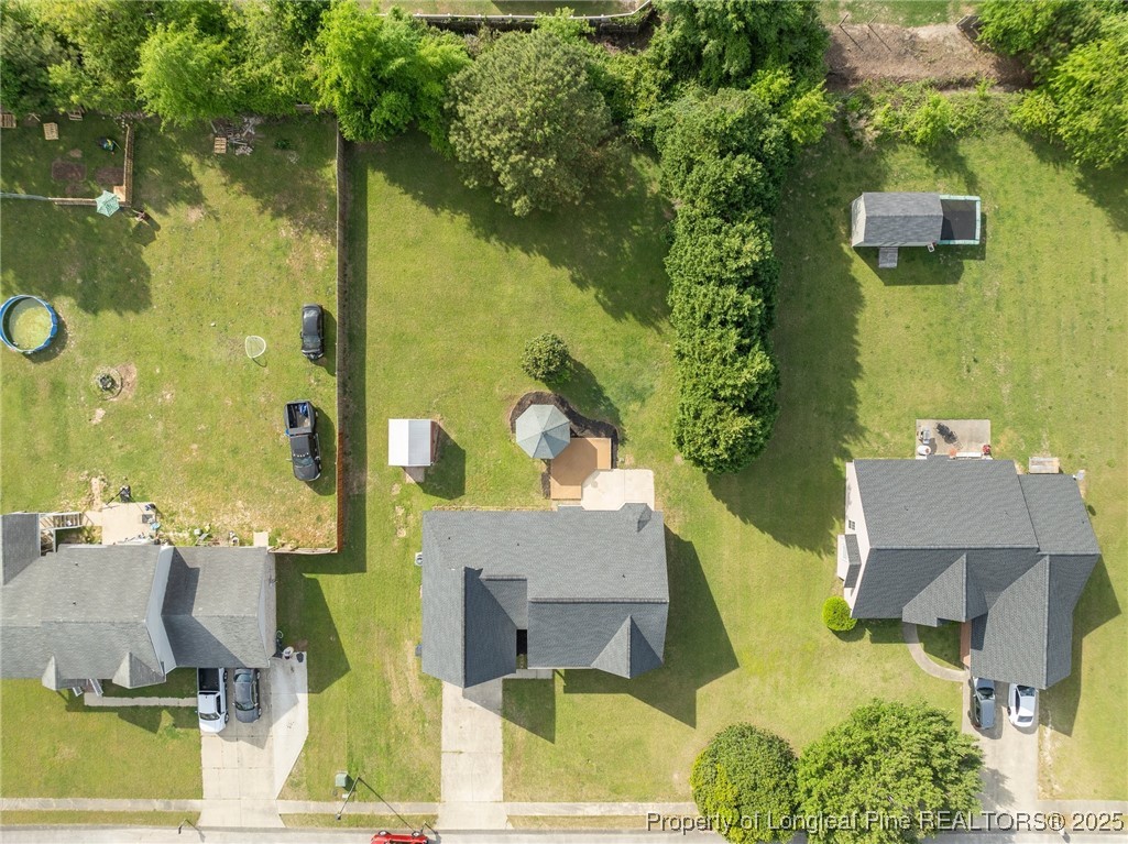124 Quail Ridge Drive Raeford, NC 28376 - Photo 37 of 39 an aerial view of a house with a swimming pool