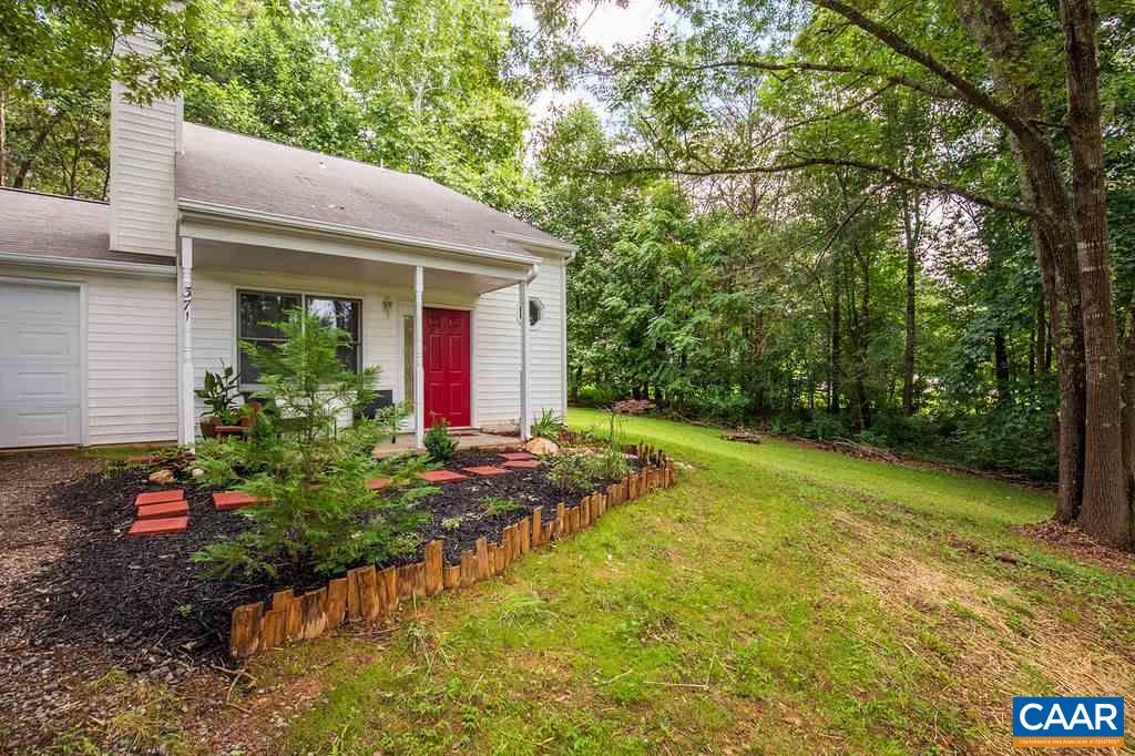 371 West Daffodil Road Ruckersville, VA 22968 - Photo 1 of 31 a view of a house with pool and garden