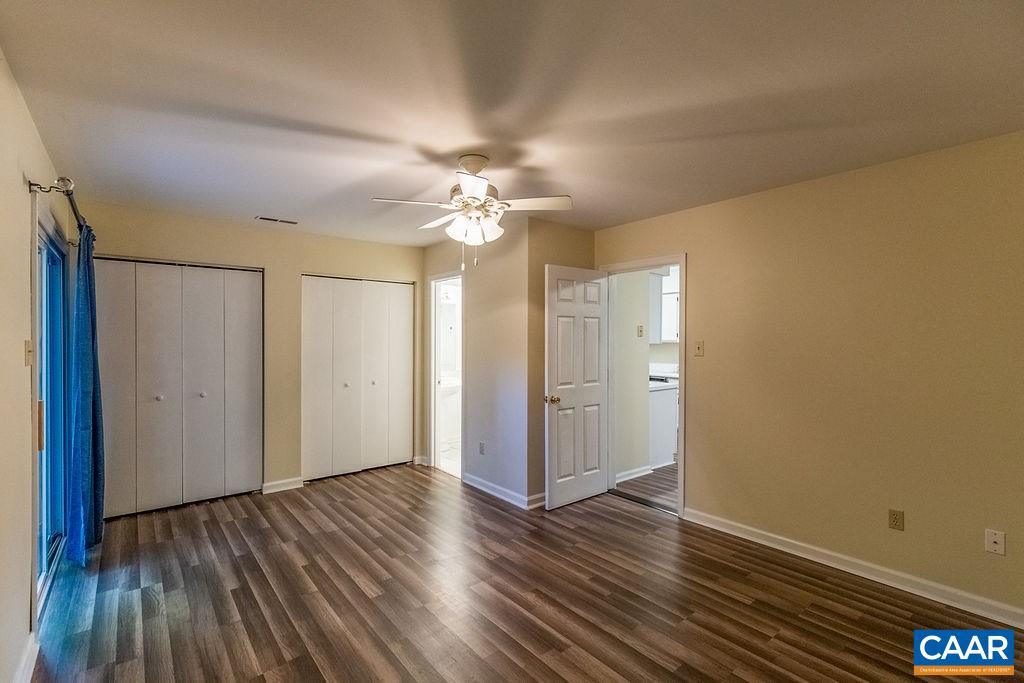 371 West Daffodil Road Ruckersville, VA 22968 - Photo 23 of 31 a view of an empty room with wooden floor