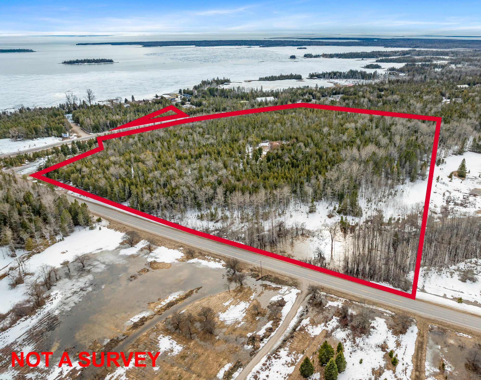 27 North 3 Mile Road Hessel, MI 49745 - Photo 42 of 49 DJI_20260415050549_0262_D-Edit