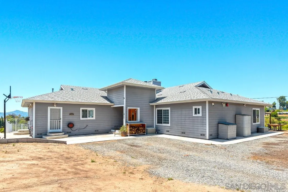 1998 La Cresta Road El Cajon, CA 92021 - Photo 5 of 70 a front view of a house with a yard