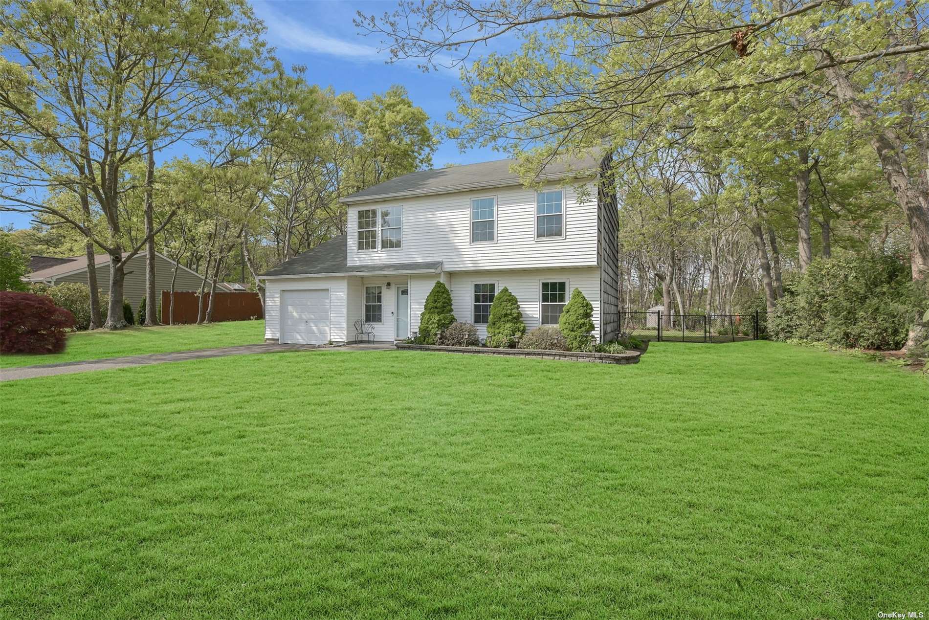 58 Marc Drive Ridge, NY 11961 - Photo 1 of 1 a view of house with backyard