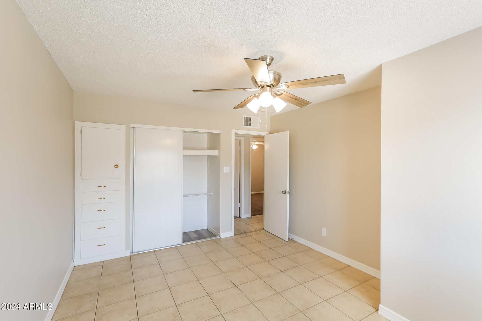 6963 West Pierson Street Phoenix, AZ 85033 - Photo 9 of 21 a view of a room with cabinet