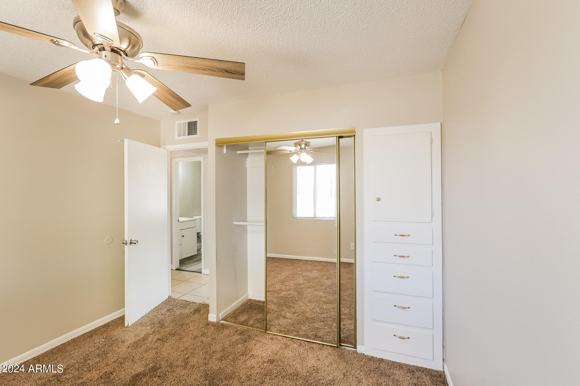 6963 West Pierson Street Phoenix, AZ 85033 - Photo 15 of 21 wooden floor in an empty room