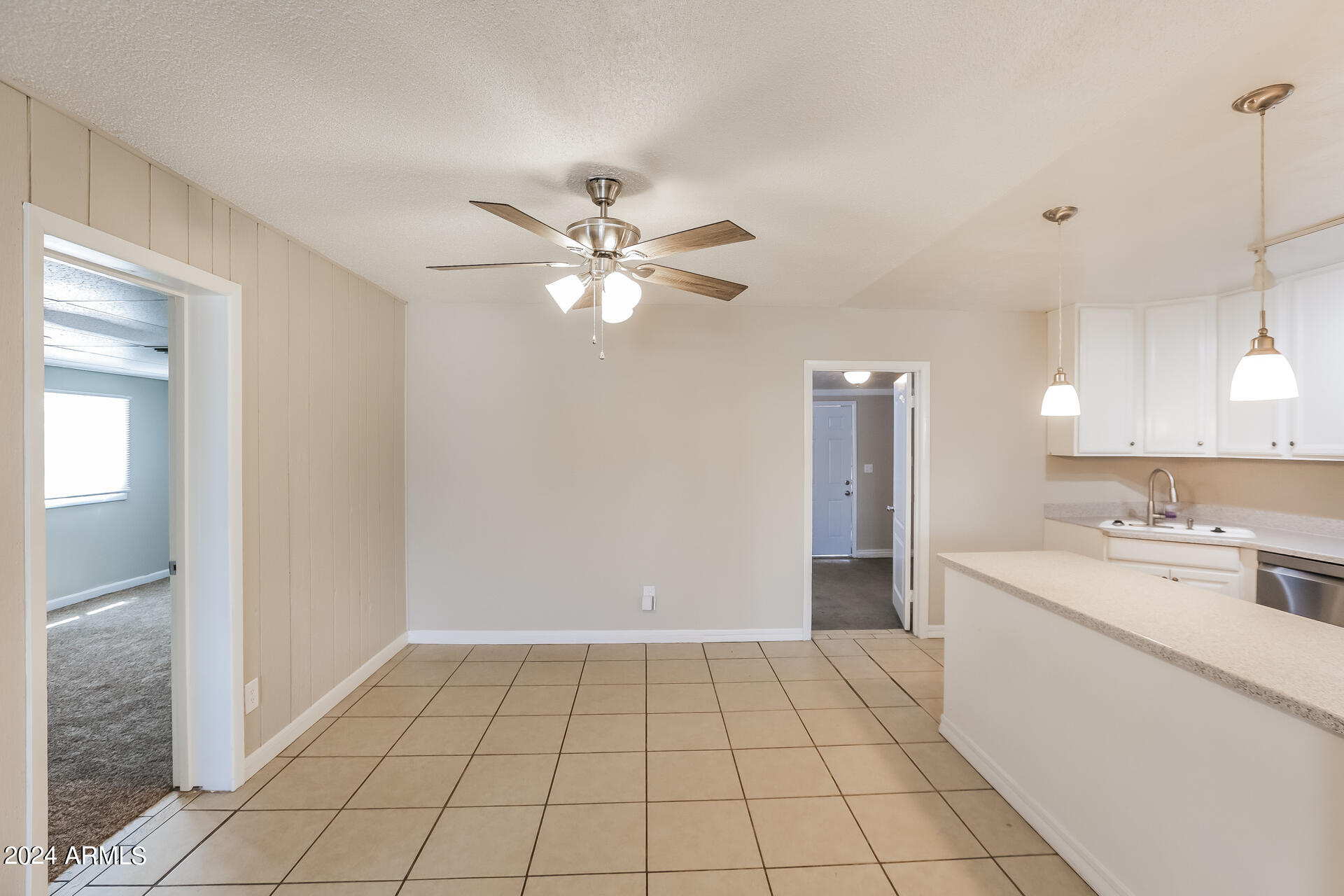 6963 West Pierson Street Phoenix, AZ 85033 - Photo 5 of 21 a view of a kitchen with a sink and a window