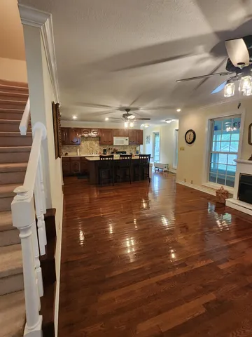 a kitchen with a table and chairs