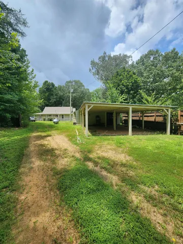a view of a livingroom with wooden floor