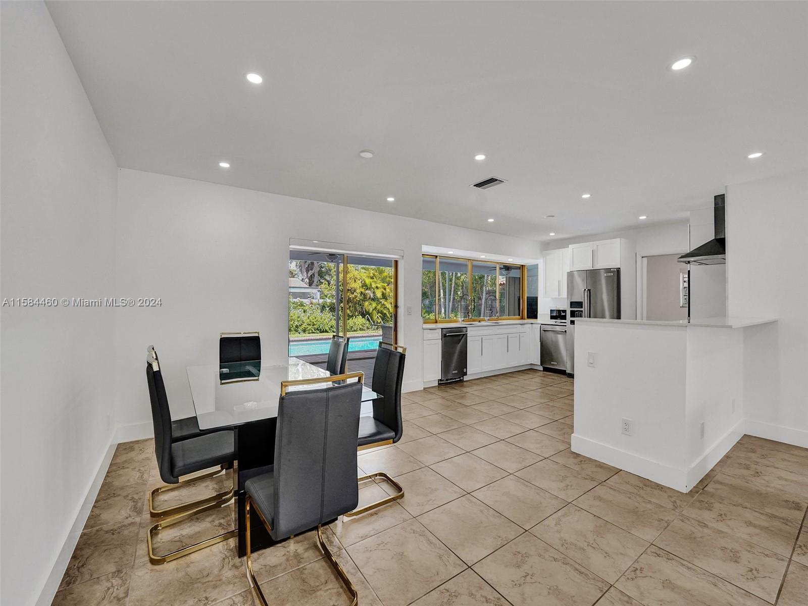 3460 North 46th Avenue Hollywood, FL 33021 - Photo 15 of 35 a view of a dining room with furniture window and outside view