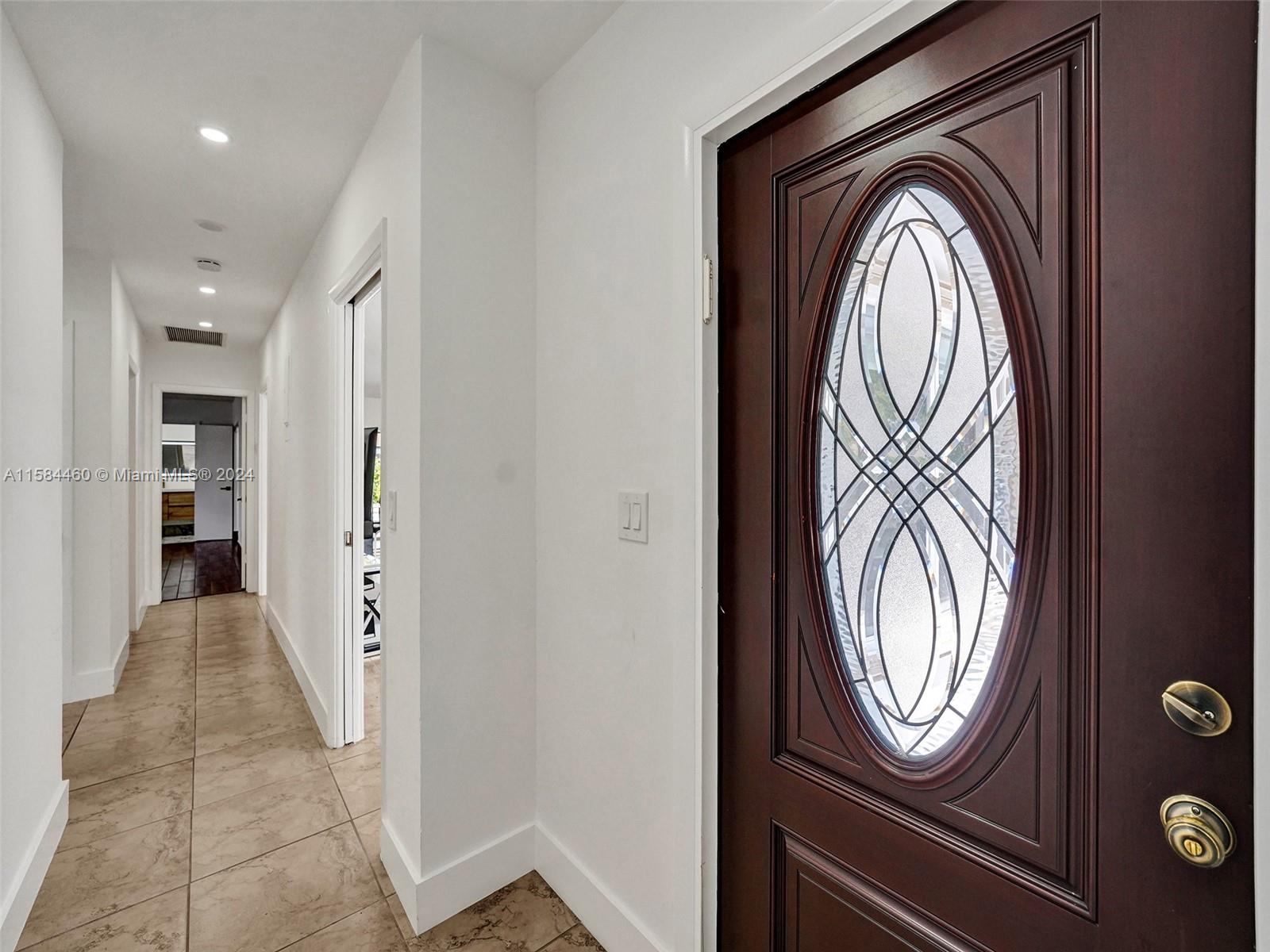 3460 North 46th Avenue Hollywood, FL 33021 - Photo 20 of 35 wooden floor with a washer and dryer