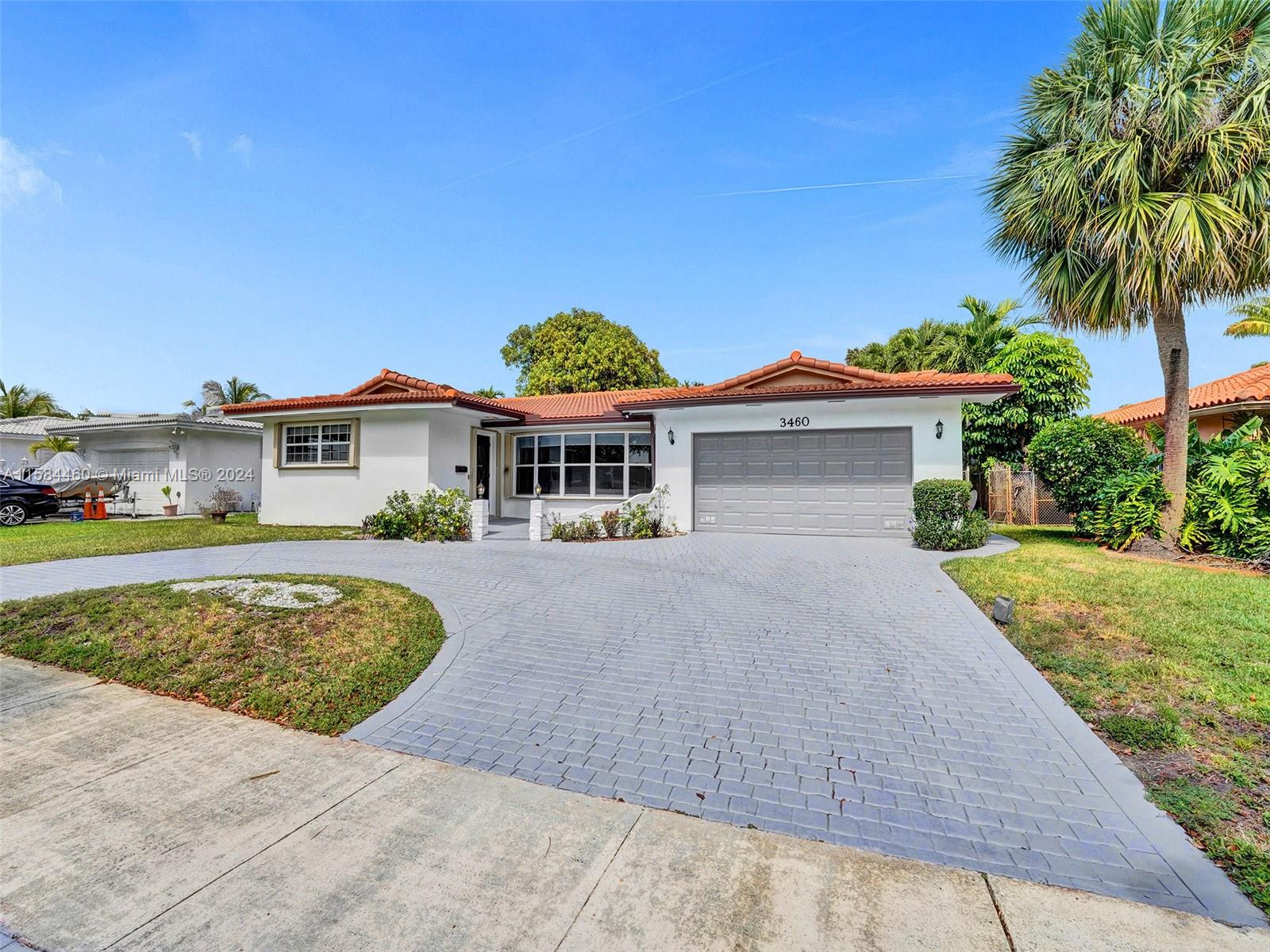 3460 North 46th Avenue Hollywood, FL 33021 - Photo 2 of 35 front view of a house with a yard